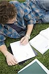 Male student studying outdoors