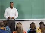 College teacher giving a lesson in a classroom