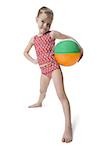 Young girl with beach ball