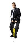 Homme d'affaires sur un pogo stick