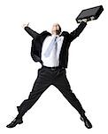 Businessman jumping with briefcase