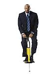 Businessman on a pogo stick