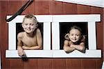 Boy and girl in a playhouse