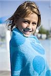 Young girl wrapped in a towel