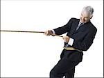 Businessman in a tug of war