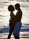 Couple embracing on beach