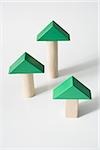 Green triangles on wooden blocks
