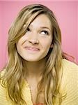 Portrait of a woman smiling looking up