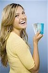 Woman smiling with credit cards