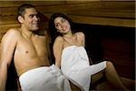 Man and woman in steam bath with towels smiling - Foto de stock -  Masterfile - Royalty Free Premium, Número: 640-02772035