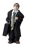 Little boy dressed as business executive