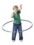 Boy playing with hula hoop