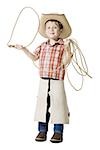 Boy with cowboy hat and lasso
