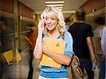 High School girl at school on mobile phone.