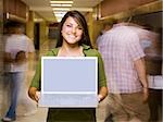 High School girl at school with a notebook computer.