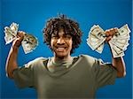 young man holding money.