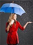 Young woman with an umbrella.