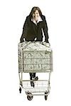 businessperson with a shopping cart full of money