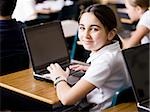 girl with laptop at school