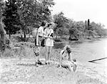 THREE YOUNG LADIES WOMEN WOODS LAKE SITTING NATURE CAMERA PHOTOGRAPHER PHOTOGRAPHY 1940s