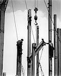 1930s 1940s CONSTRUCTION IRON WORKERS ERECTING STEEL BEAMS