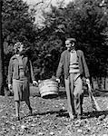1930s 1940s TEEN COUPLE CARRYING BASKET AUTUMN LEAVES