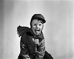 1950s BOY DRESSED FOR WINTER HAT SCARF MUFFLER JACKET EXCITED EXPRESSION
