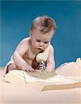 1960s BABY READING PHONE BOOK YELLOW PAGES WITH TELEPHONE RECEIVER ON SHOULDER