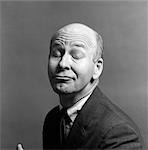 CHARACTER BALD MAN SUIT TIE FUNNY FACE EXPRESSION WRINKLED BROW EYES CLOSED