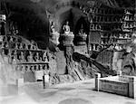 1920s 1930s INTERIOR SCENE IN THE CAVE OF THE THOUSAND 1000 BUDDHAS HANGCHOW CHINA BUDDHIST RELIGION