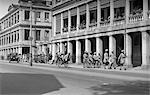1920s 1930s STREET SCENE CHINA HONG KONG RICKSHAW GROUP OF INDIAN SOLDIERS WITH RIFLES MARCHING BY