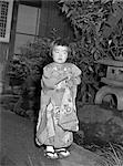 1960s MARI SMALL GEISHA LITTLE GIRL IN NATIVE JAPANESE COSTUME KIMONO ROBE OBI TONGS ASIAN CULTURE