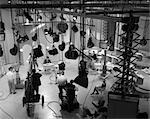 1960s PARTIAL OVERHEAD FROM BEHIND SCENES OF TELEVISION STATION FILMING TALK SHOW