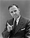 1940s MAN IN SUIT POINTING FINGER