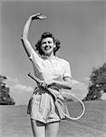 1930s 1940s WOMAN TENNIS PLAYER WAVING SMILING HOLDING RACKET