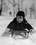 1920s 1930s BOY ON SLED FACING CAMERA