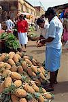 Market vendor selling pineapples, main market area, Kandy, Sri Lanka, Asia