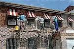 Decorating outside of a house, St. George's, Grenada, Windward Islands, West Indies, Caribbean, Central America