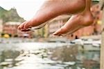 Woman Dipping Her Feet in Water, Near Beach in Vernazza, Liguria, Italy