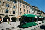 Trams run along Herrengasse, stop at Hauptplatz in main street of old town, Graz, Styria, Austria, Europe