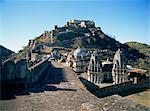 Foreground paved battlements, temples and Badal Mahal (Cloud Palace), Kumbalgarh Fort, Rajasthan state, India, Asia