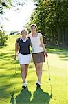 Mother and Daughter Golfing