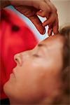 Woman Receiving Acupuncture