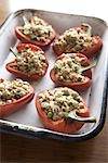 Stuffed Peppers With Couscous Peas and Cheese in Baking Pan