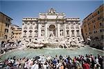 A crowd at trevi fountain