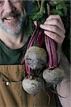 Man with beetroot