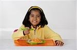 Girl eating briyani rice