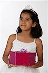 girl holding gift