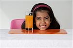 Girl with glass of juice