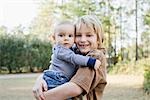 Boy Holding Baby Brother